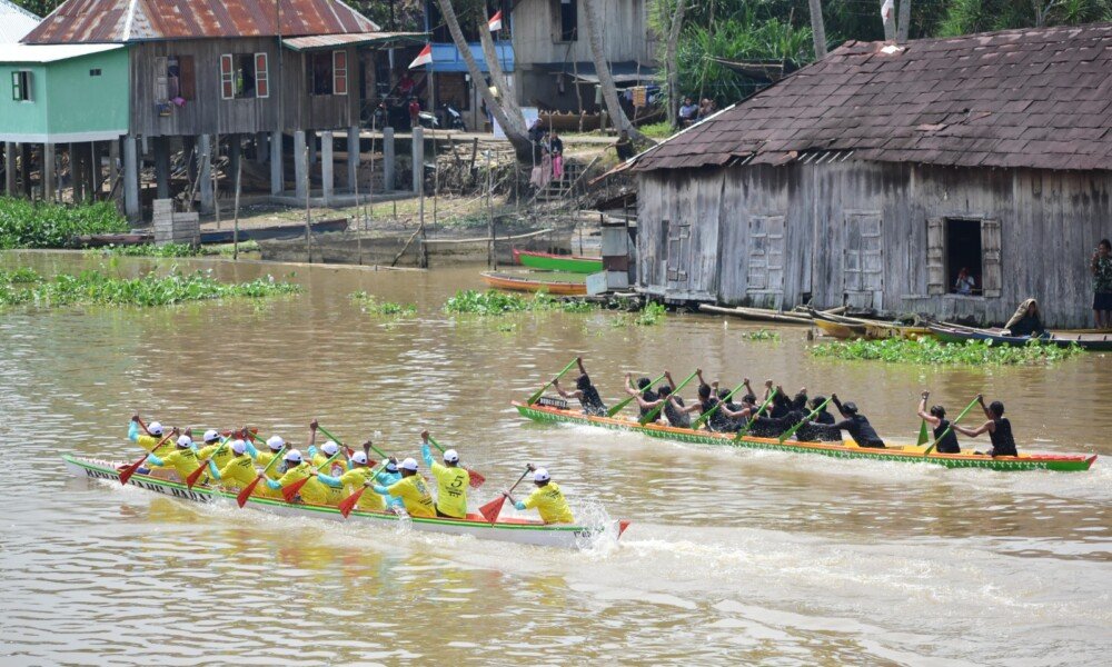 Serunya Lomba Kebut Perahu di Sungai Babatan, Pemenang Boyong Sapi hingga Kerbau
