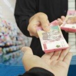 “Rupiah Mabuk di Pasar, Investor Senyum atau Garuk Kepala?”